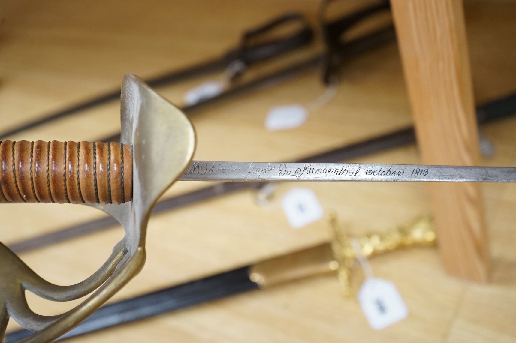 A Victorian Royal Artillery officer’s sword in poor condition and a copy of a French 1813 Cuirassier’s sword (2)
